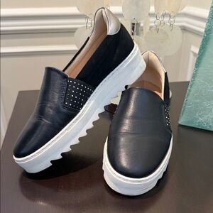 Clarks Tansy Black Leather and Silver Accent Slip-On Platform Sneakers